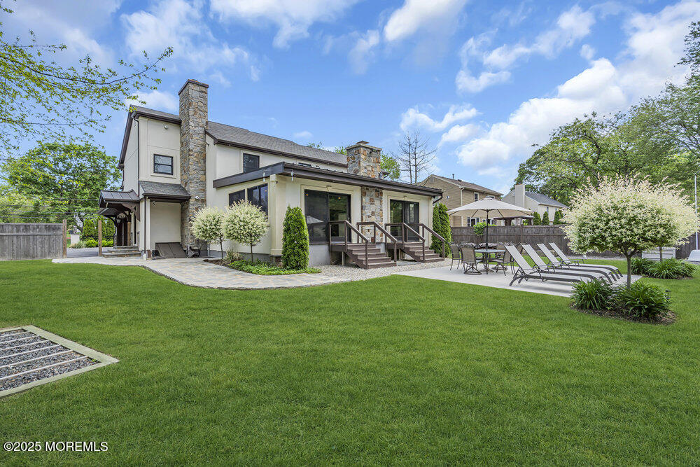 620 Brookside Drive Toms River, NJ 08753 - Photo 49 of 88 a front view of a house with garden