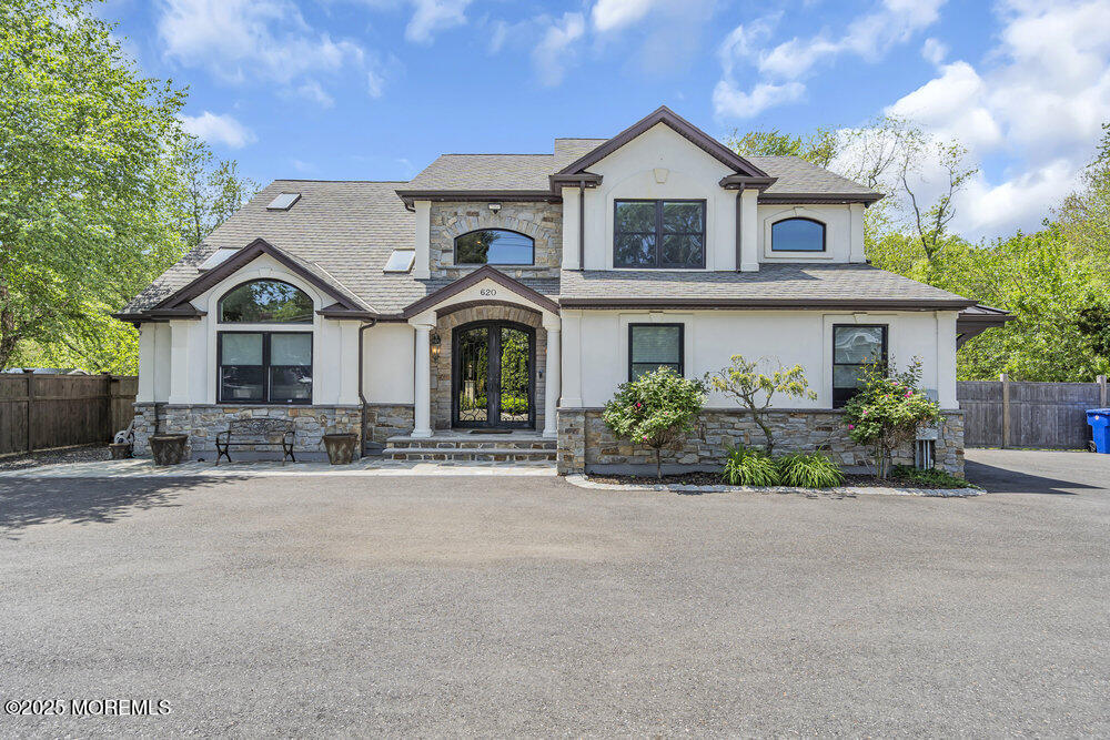 620 Brookside Drive Toms River, NJ 08753 - Photo 81 of 88 a front view of a house with a yard