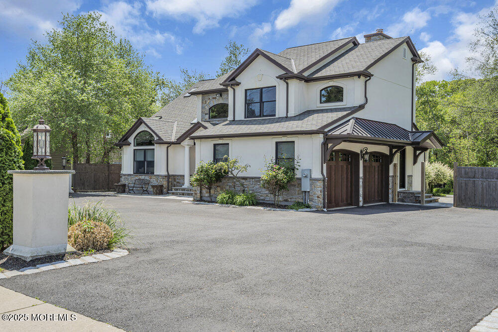 620 Brookside Drive Toms River, NJ 08753 - Photo 83 of 88 a front view of a house with garden