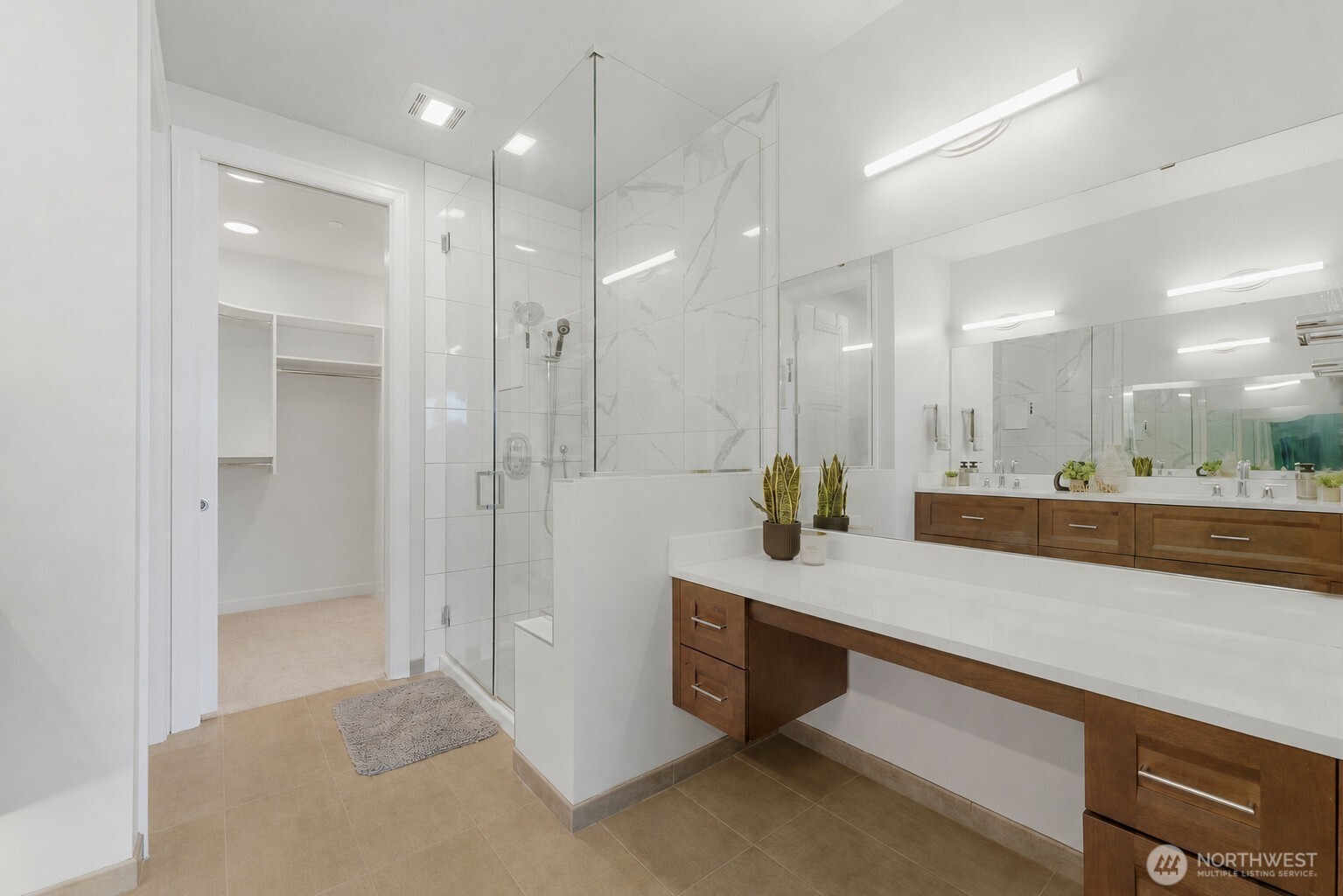 4907 Main Street, Unit 214 Tacoma, WA 98407 - Photo 13 of 34 a large bathroom with a double vanity sink and a mirror
