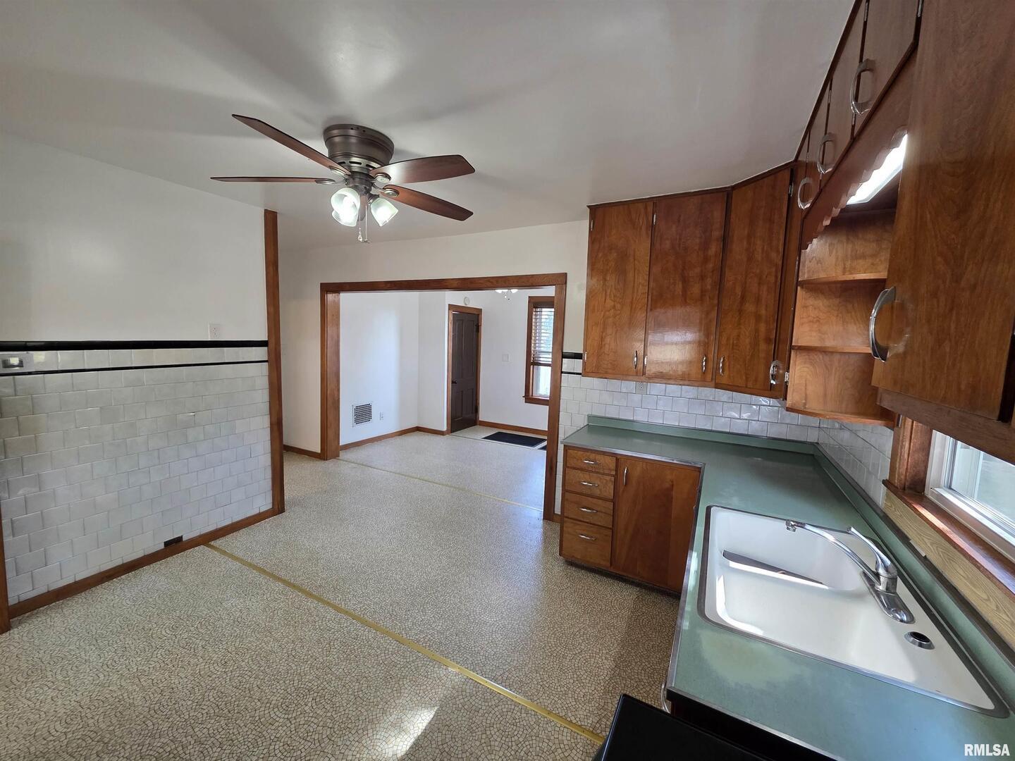 13600 Kennedy Road Fulton, IL 61252 - Photo 11 of 42 a view of an empty room with a window