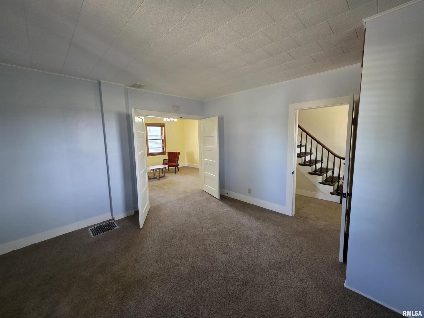 13600 Kennedy Road Fulton, IL 61252 - Photo 17 of 42 a view of a room with a hallway