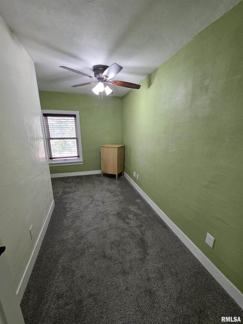 13600 Kennedy Road Fulton, IL 61252 - Photo 20 of 42 a view of empty room with window and ceiling fan