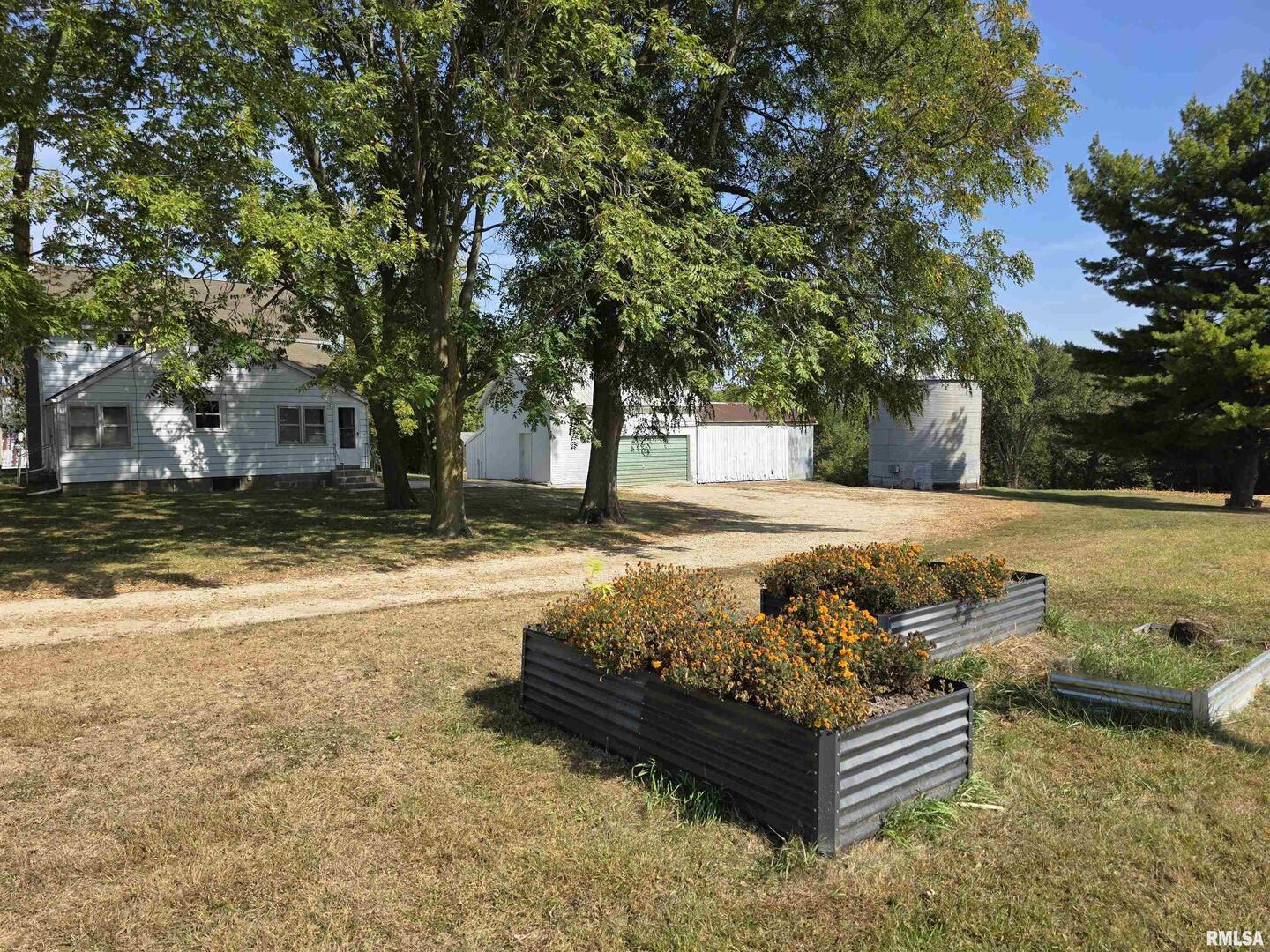 13600 Kennedy Road Fulton, IL 61252 - Photo 2 of 42 a view of a yard with furniture and tree