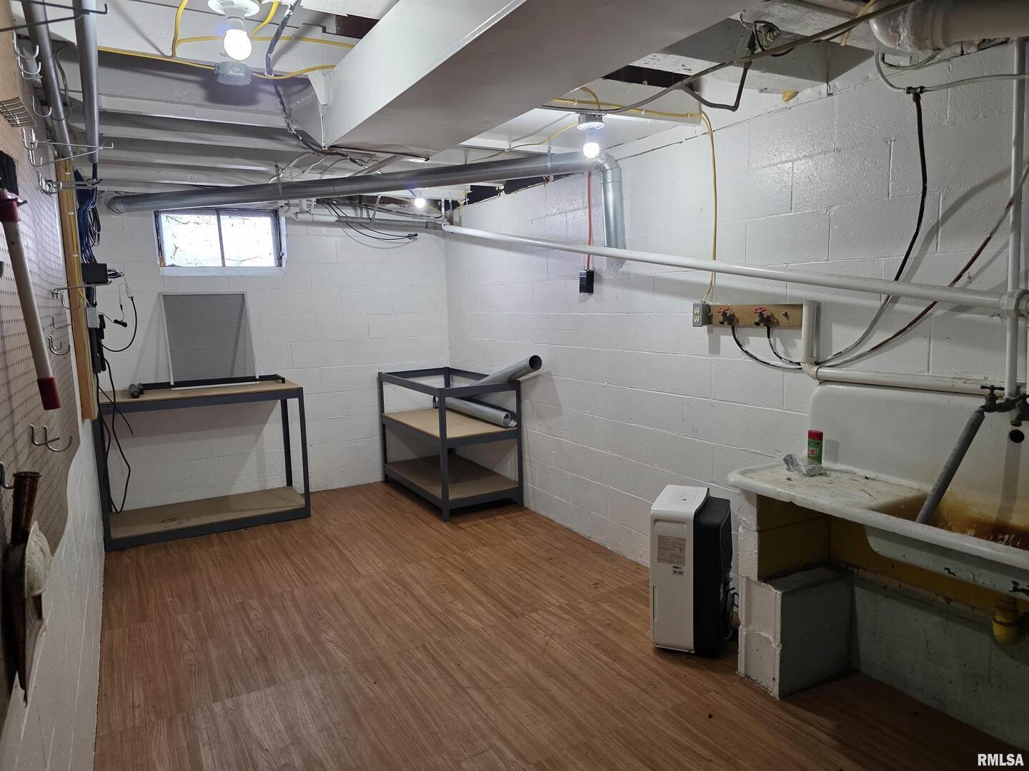 13600 Kennedy Road Fulton, IL 61252 - Photo 24 of 42 a view of a room with racks on the wall