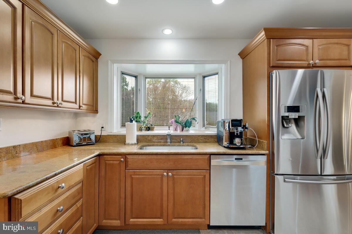 7001 Old Stage Road North Bethesda, MD 20852 - Photo 11 of 33 Gourmet Kitchen w/ Bay Window Overlooking Backyard