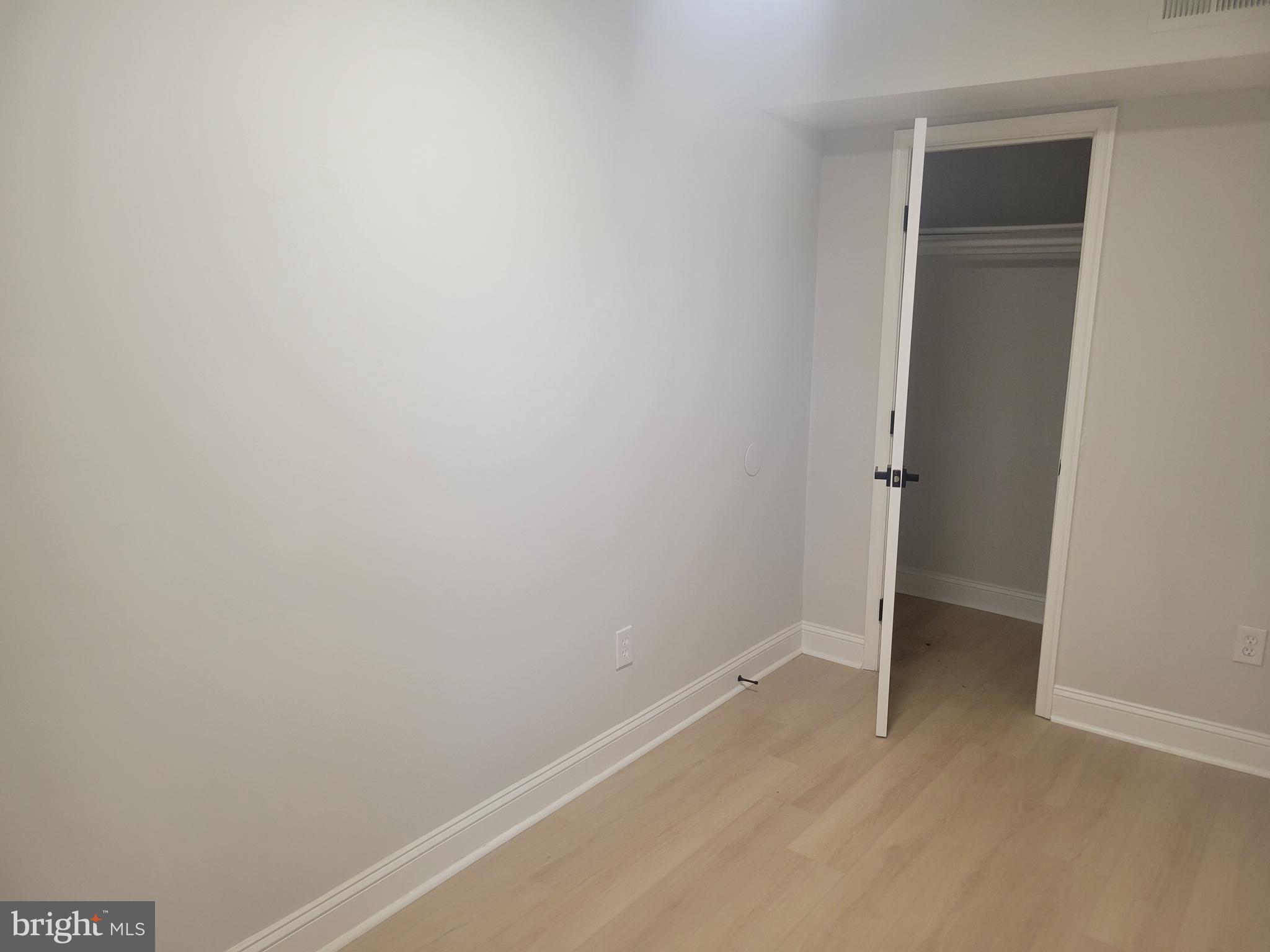1250 Queen Street Northeast, Unit 1 Washington, DC 20002 - Photo 3 of 13 a view of an empty room