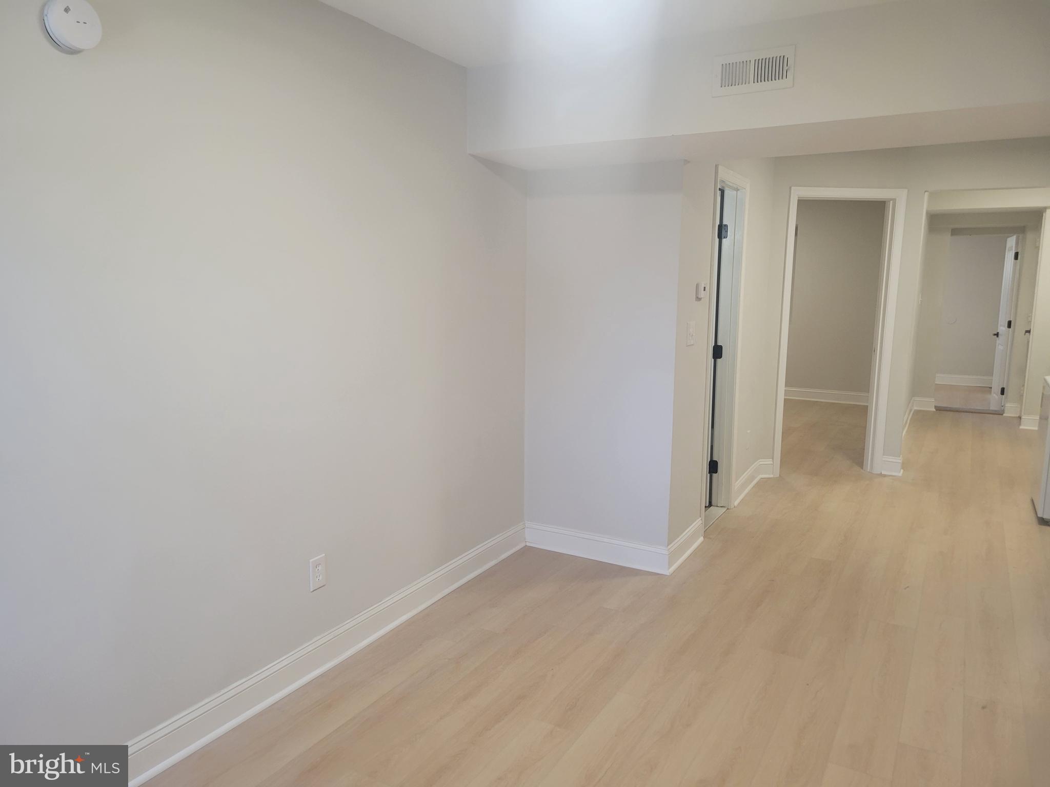 1250 Queen Street Northeast, Unit 1 Washington, DC 20002 - Photo 4 of 13 a view of an empty room