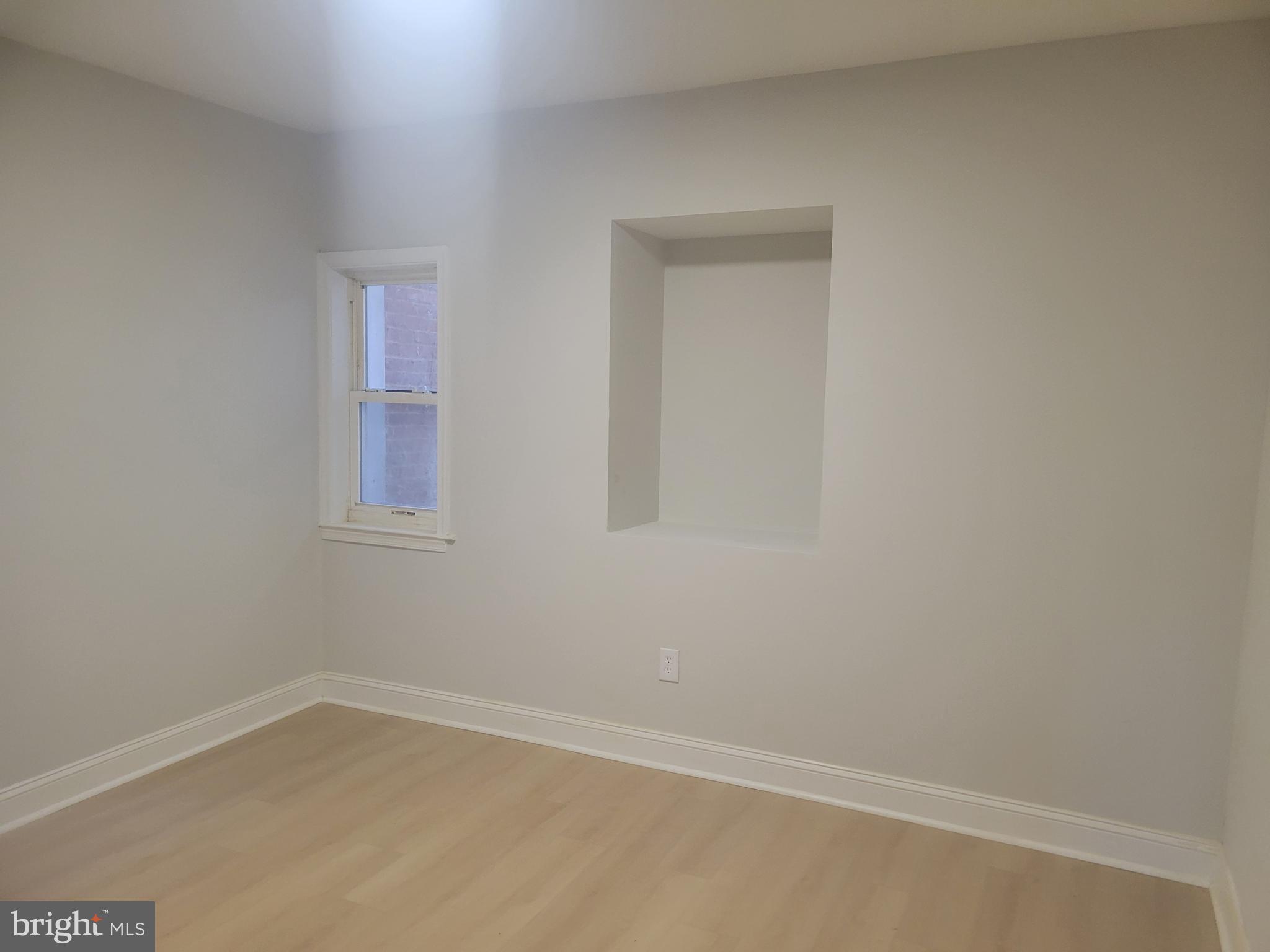 1250 Queen Street Northeast, Unit 1 Washington, DC 20002 - Photo 9 of 13 a room that has a window in it