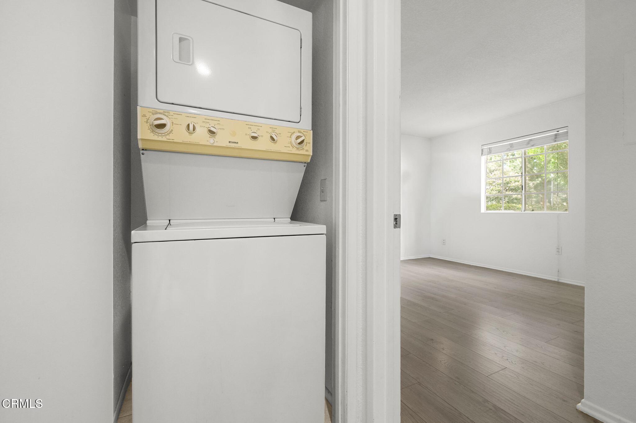 1195 Fitzgerald Road, Unit C Simi Valley, CA 93065 - Photo 13 of 26 a utility room with dryer and washer