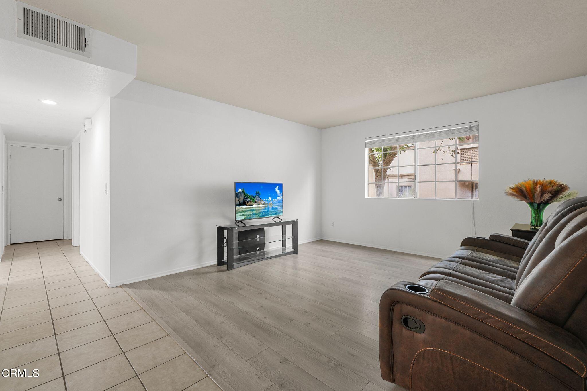 1195 Fitzgerald Road, Unit C Simi Valley, CA 93065 - Photo 21 of 26 a living room with furniture