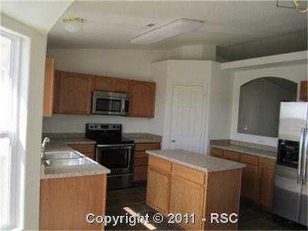 4823 Rusty Nail Point, Unit 201 Colorado Springs, CO 80916 - Photo 5 of 15 Gallery Image 5
