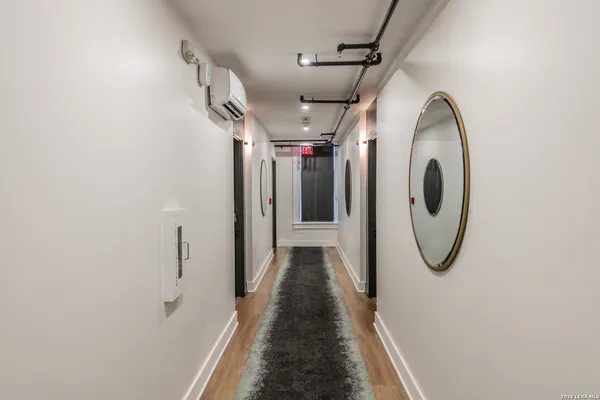 a view of a entryway with wooden floor