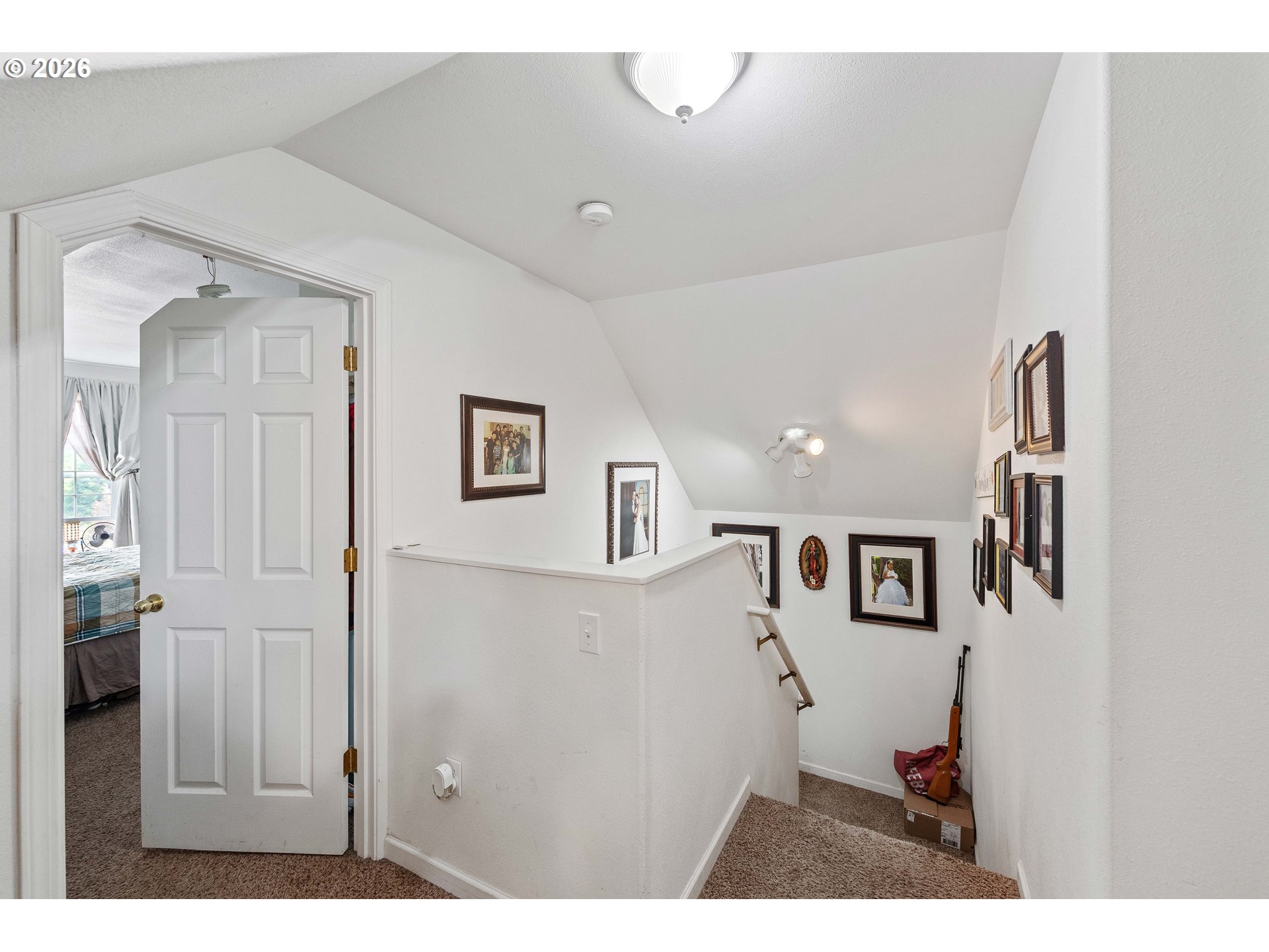 1123 South Morrison Street Coos Bay, OR 97420 - Photo 19 of 47 a view of a hallway with paintings on the wall