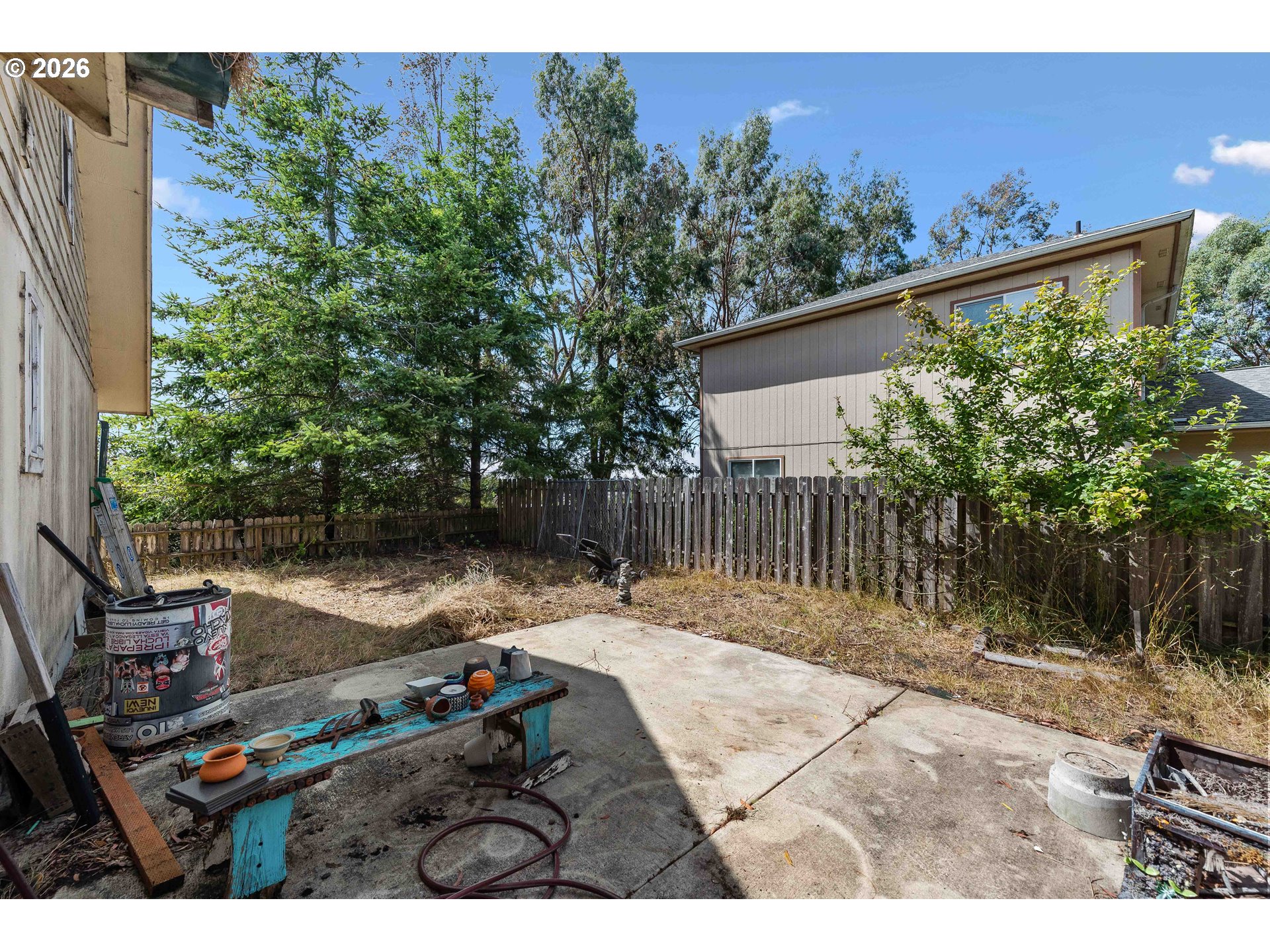 1123 South Morrison Street Coos Bay, OR 97420 - Photo 21 of 47 a backyard of a house with lots of green space