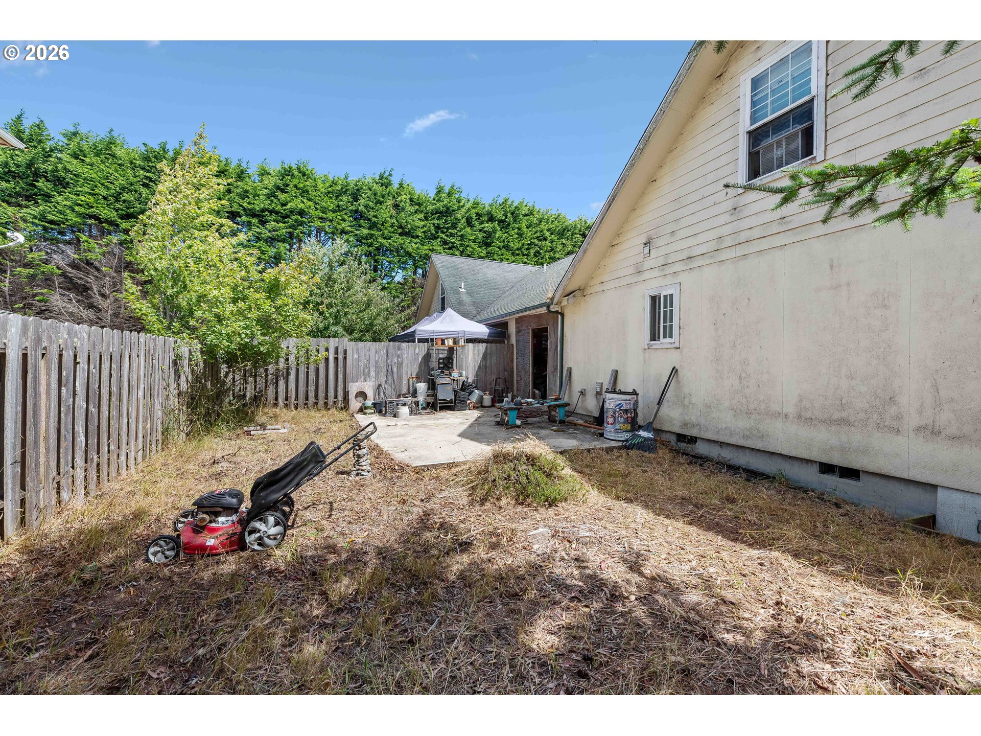 1123 South Morrison Street Coos Bay, OR 97420 - Photo 22 of 47 a view of a backyard with a sitting area