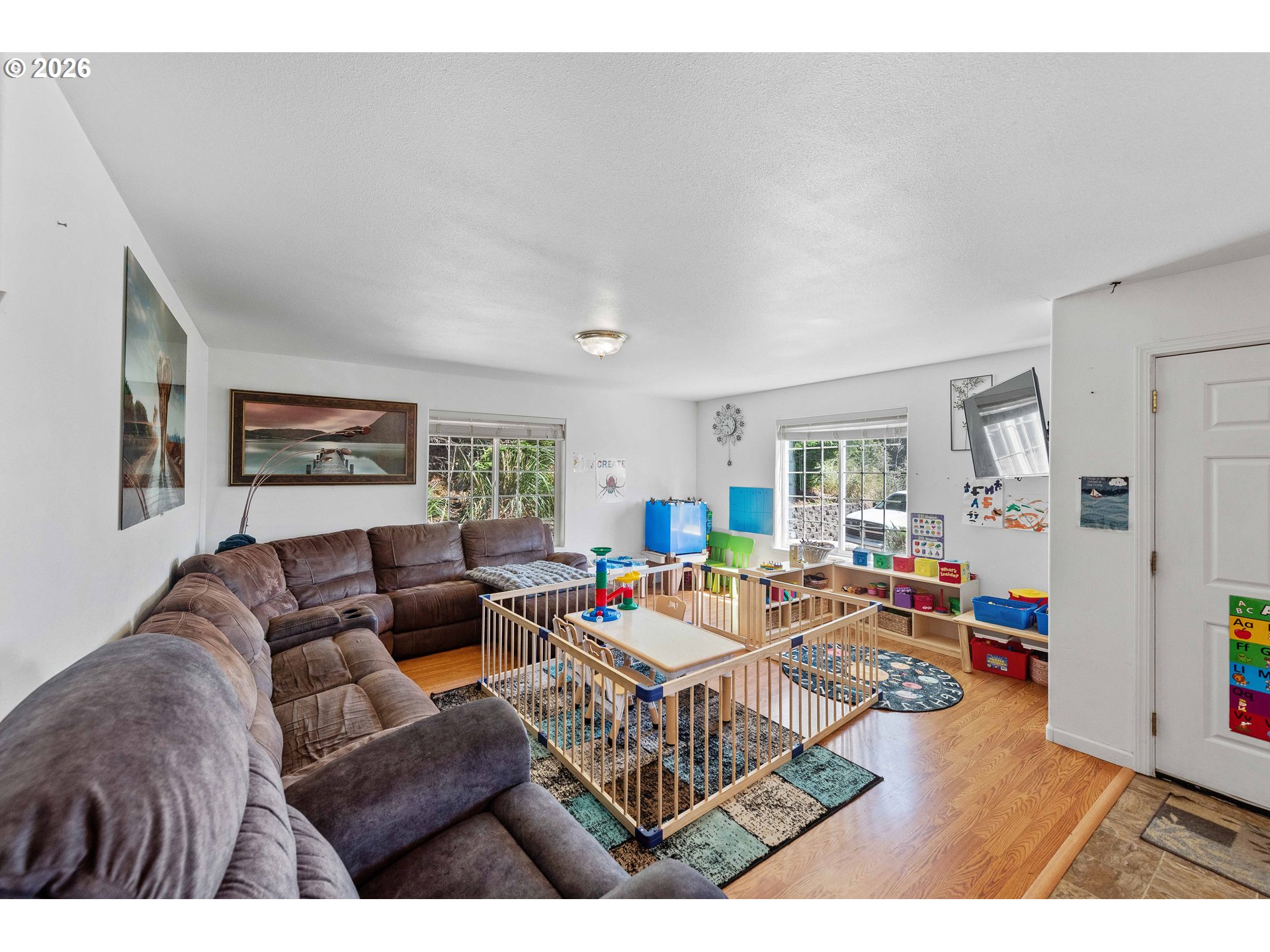 1123 South Morrison Street Coos Bay, OR 97420 - Photo 24 of 47 a living room with furniture and a wooden floor