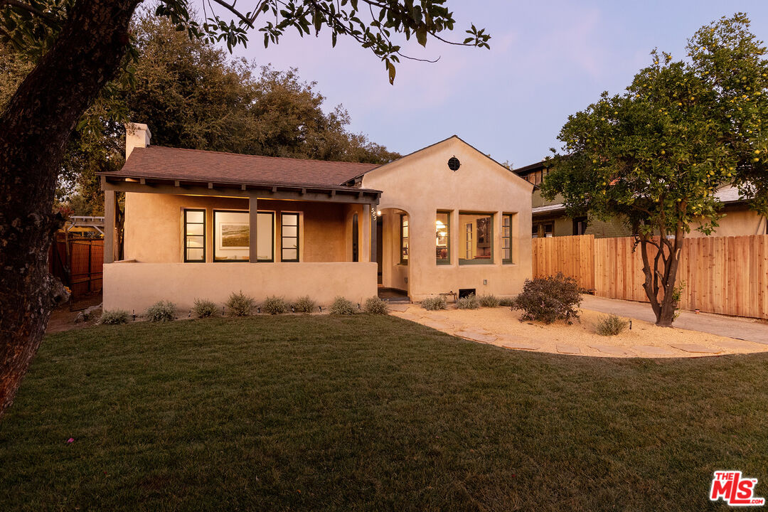 585 Mountain View Street Altadena, CA 91001 - Photo 2 of 31 a front view of a house with a yard