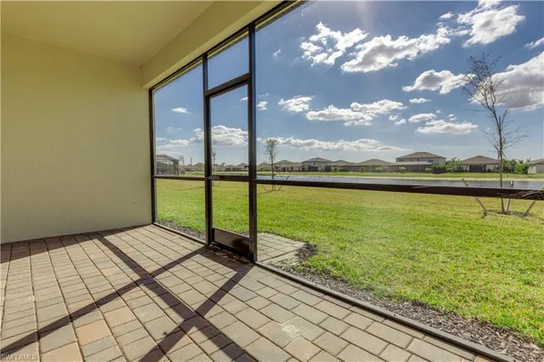 a view of a yard with an ocean view