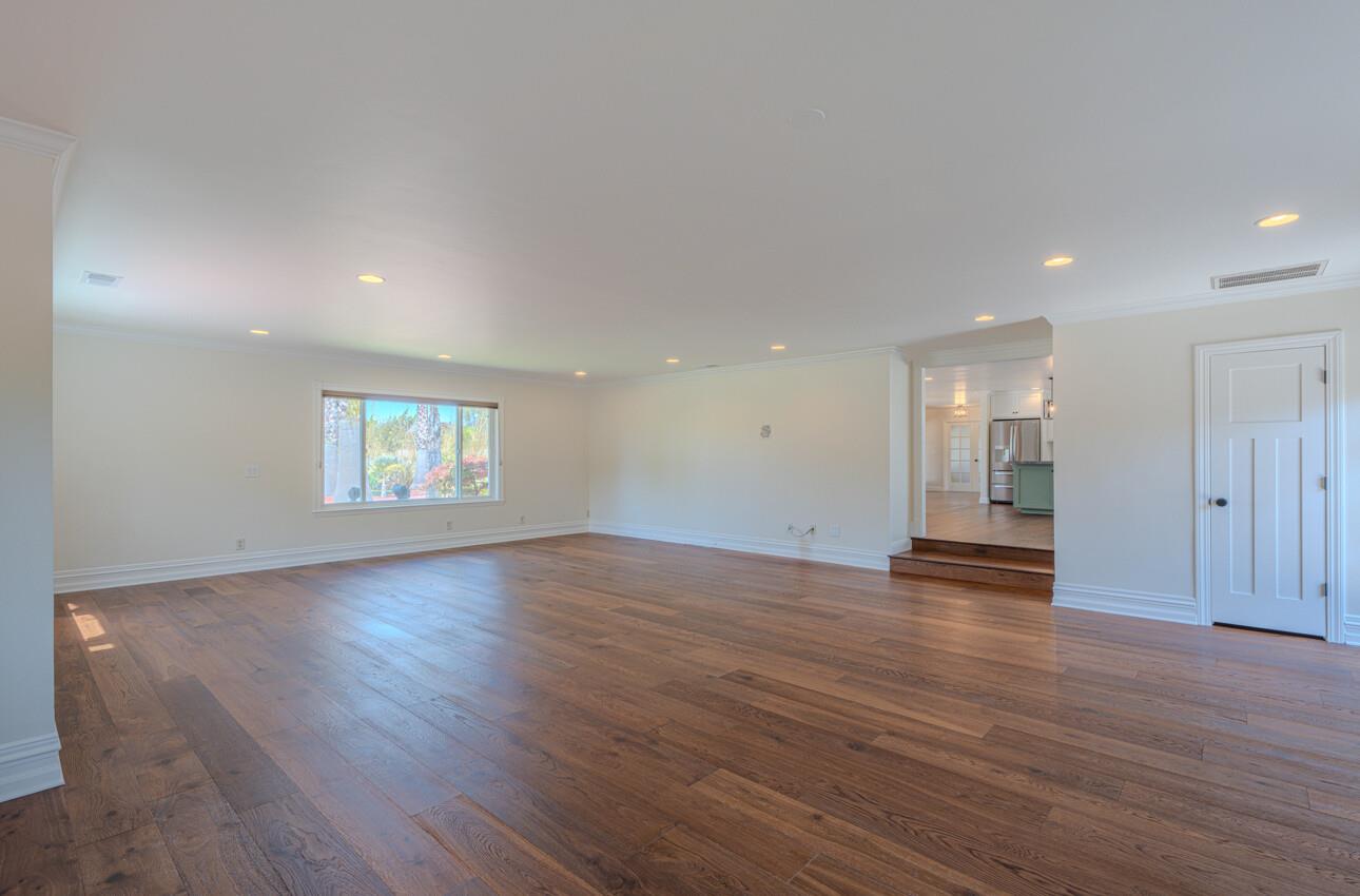22125 Ranchito Drive Salinas, CA 93908 - Photo 27 of 66 an empty room with wooden floor and window