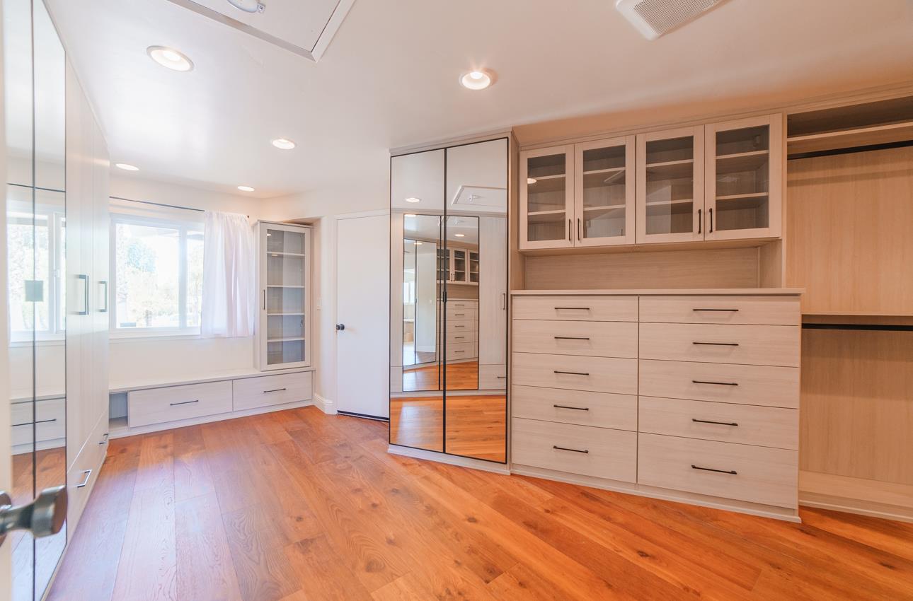 22125 Ranchito Drive Salinas, CA 93908 - Photo 37 of 66 a view of an empty room with wooden floor and cabinet