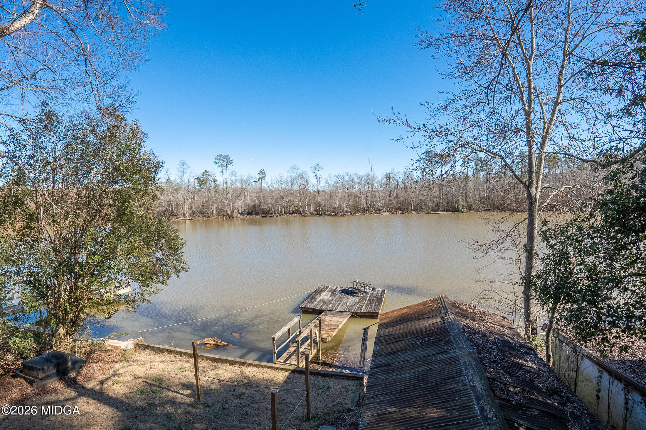 199 Cherokee Drive Jackson, GA 30233 - Photo 18 of 25 a view of a lake with outdoor seating