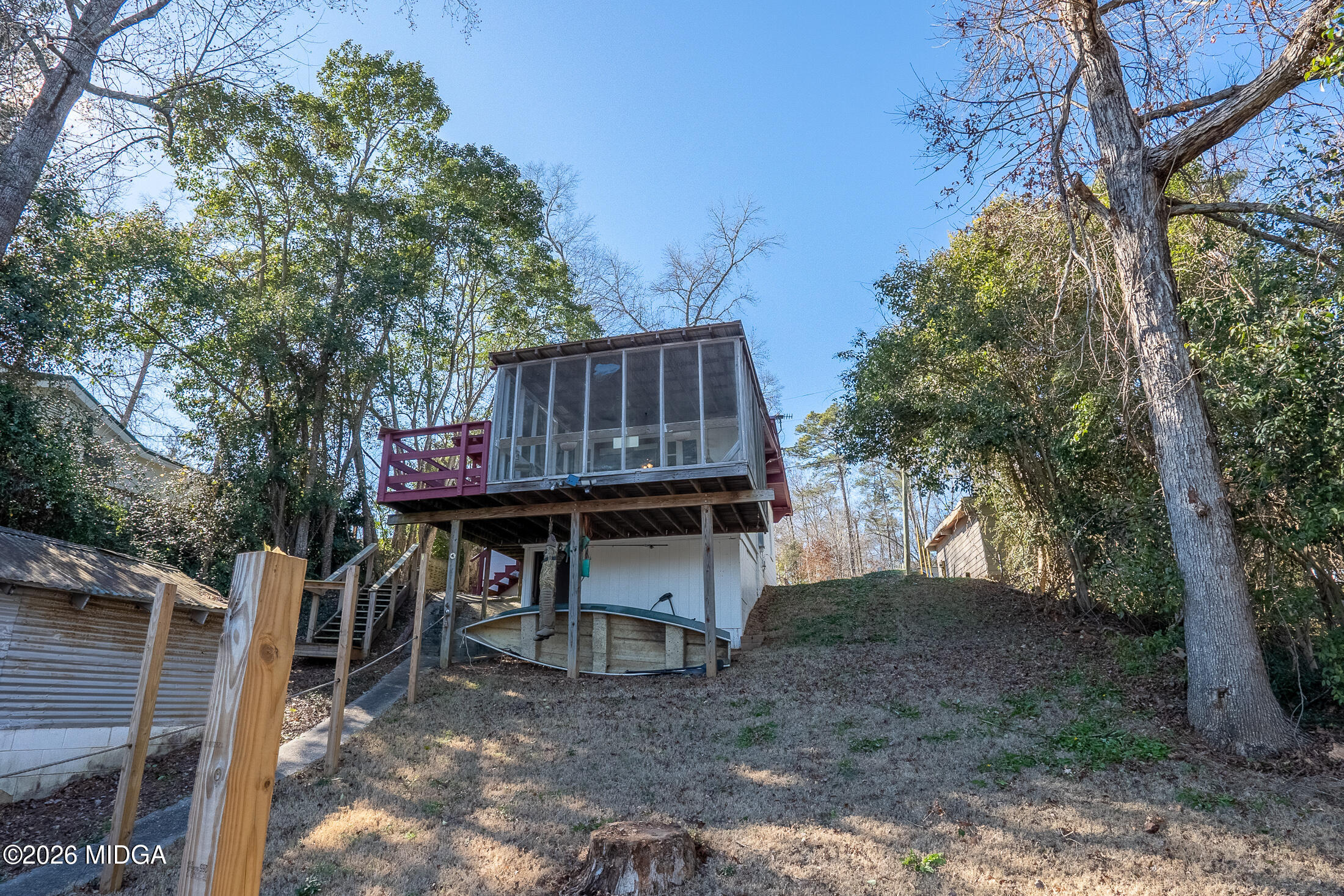 199 Cherokee Drive Jackson, GA 30233 - Photo 20 of 25 a wooden fence with trees in the background