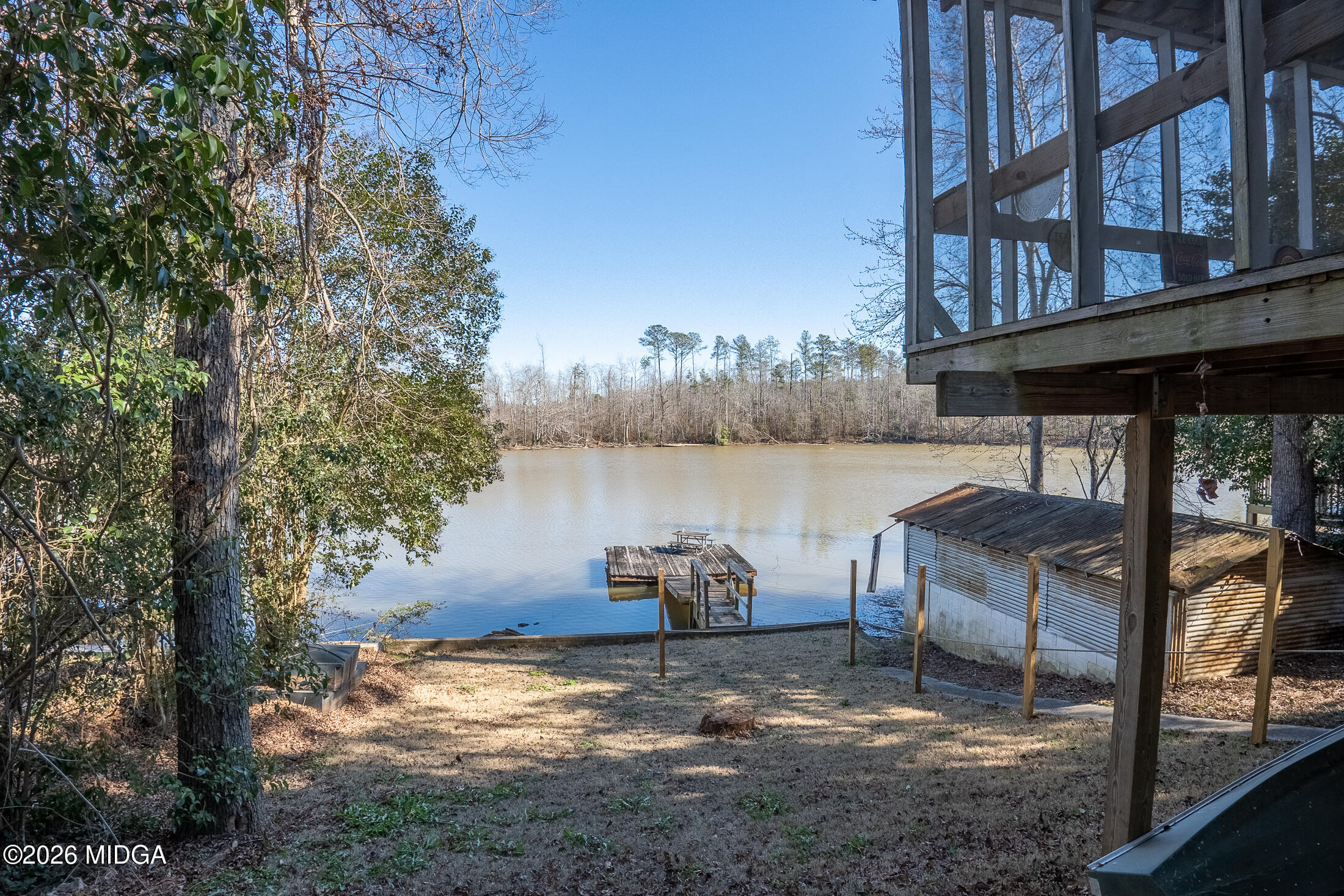 199 Cherokee Drive Jackson, GA 30233 - Photo 2 of 25 a backyard of a house with table and chairs