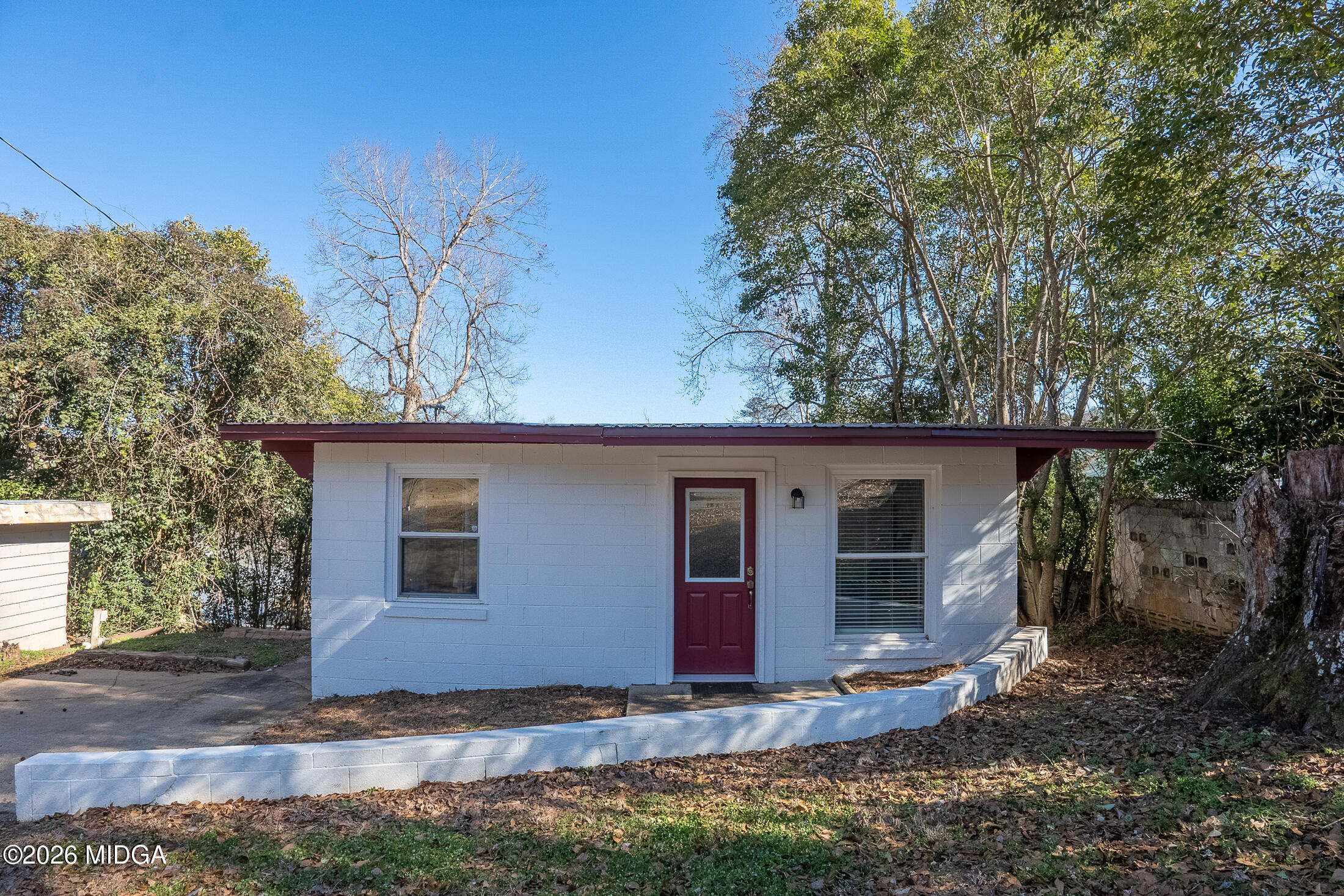 199 Cherokee Drive Jackson, GA 30233 - Photo 3 of 25 a view of house with trees in the background