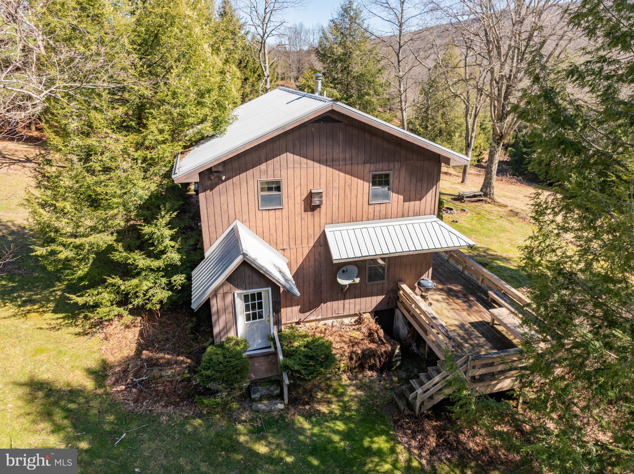 1157 Lakeford Road Terra Alta, WV 26764 - Photo 11 of 33 Charming woodland retreat awaits you.