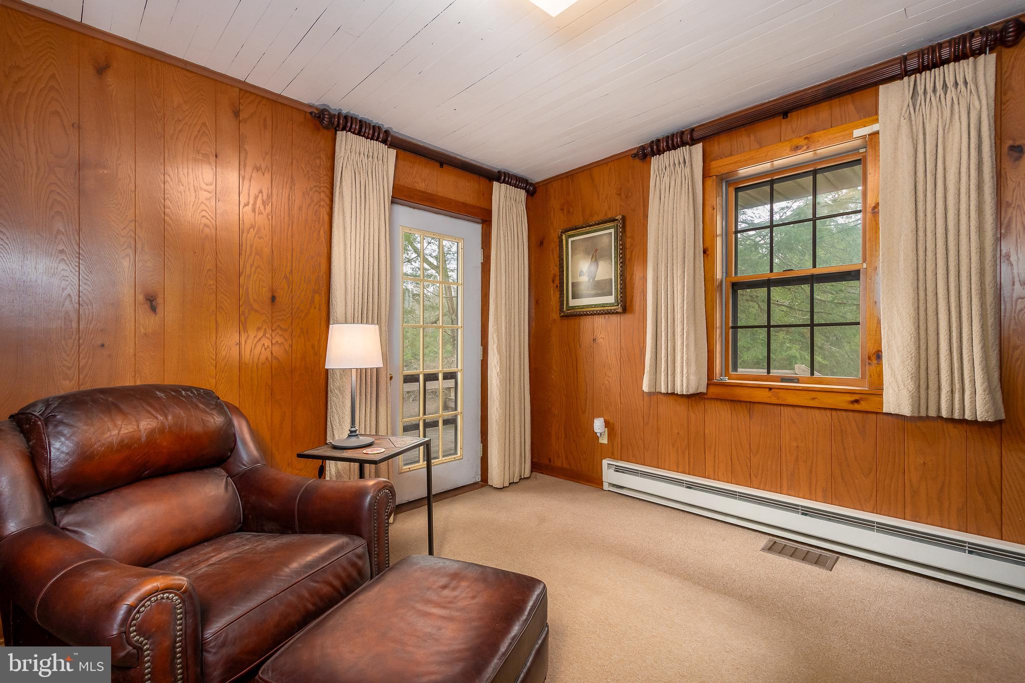 1157 Lakeford Road Terra Alta, WV 26764 - Photo 24 of 37 a living room with furniture and a window