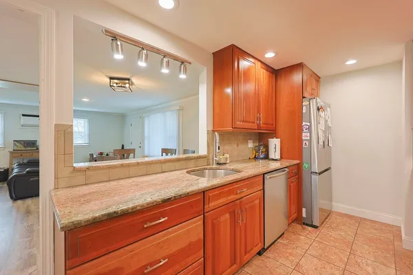 a bathroom with a sink double vanity and a mirror