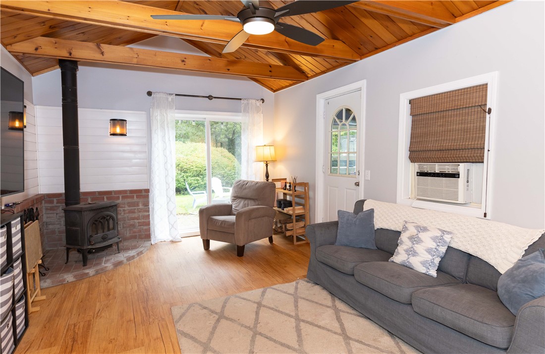 91 Plains Road South Kingstown, RI 02892 - Photo 12 of 23 Den with wood burning fireplace