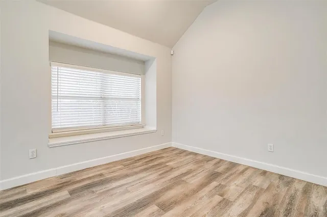 a kitchen with a stove and a microwave