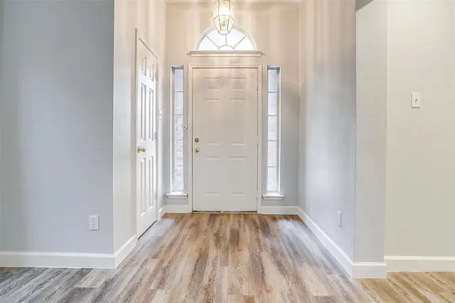 a bathroom with a sink a toilet and a bathtub