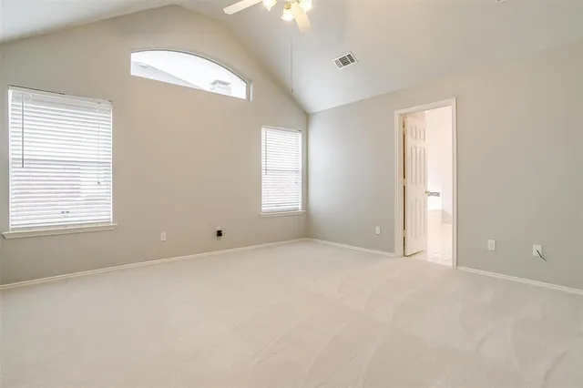 an empty room with windows