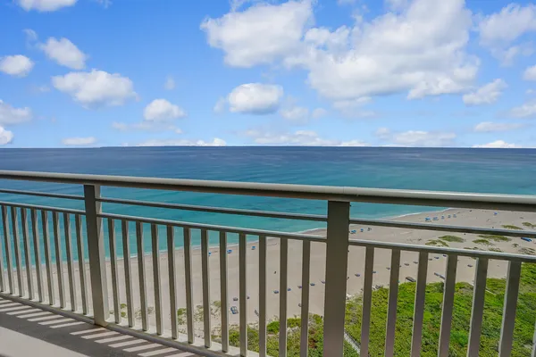 a view of a balcony with an outdoor space