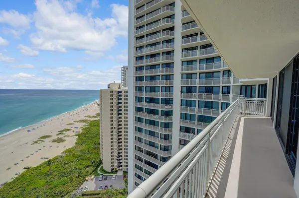 a view of a building from a balcony