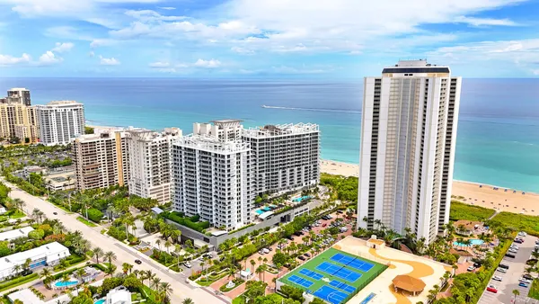 a view of a city with tall buildings