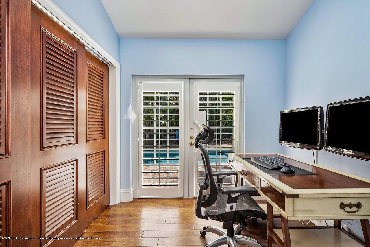 57 River Drive Ocean Ridge, FL 33435 - Photo 13 of 43 a view of a workspace with furniture and a window