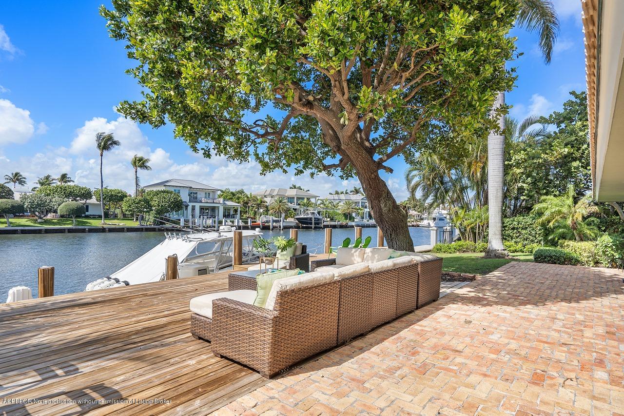 57 River Drive Ocean Ridge, FL 33435 - Photo 3 of 43 a view of a lake with a house