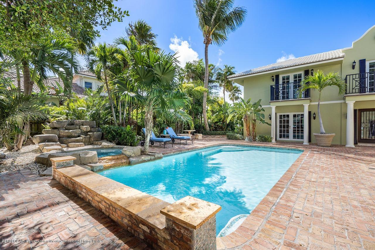 57 River Drive Ocean Ridge, FL 33435 - Photo 27 of 43 a view of a house with swimming pool and sitting area