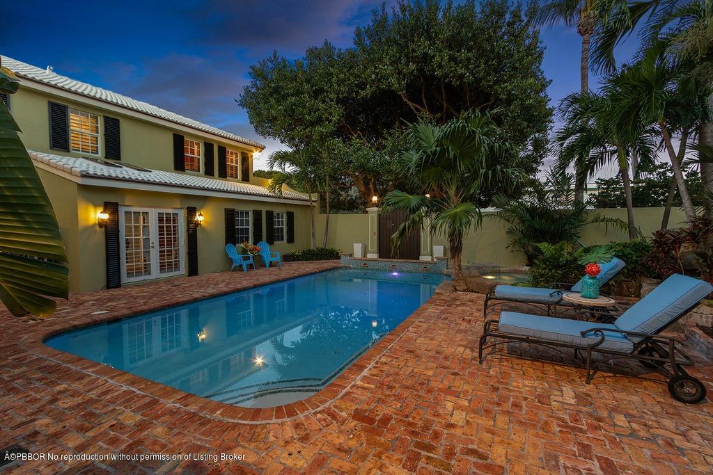 57 River Drive Ocean Ridge, FL 33435 - Photo 39 of 43 a view of a house with swimming pool and sitting area