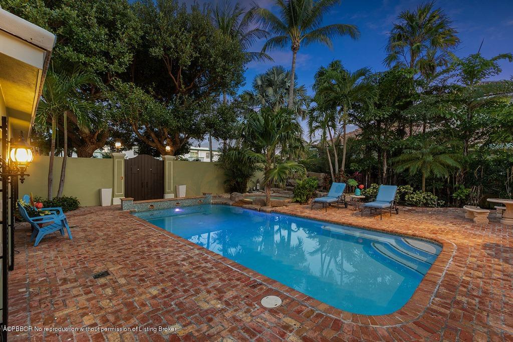 57 River Drive Ocean Ridge, FL 33435 - Photo 40 of 43 a view of a backyard with swimming pool