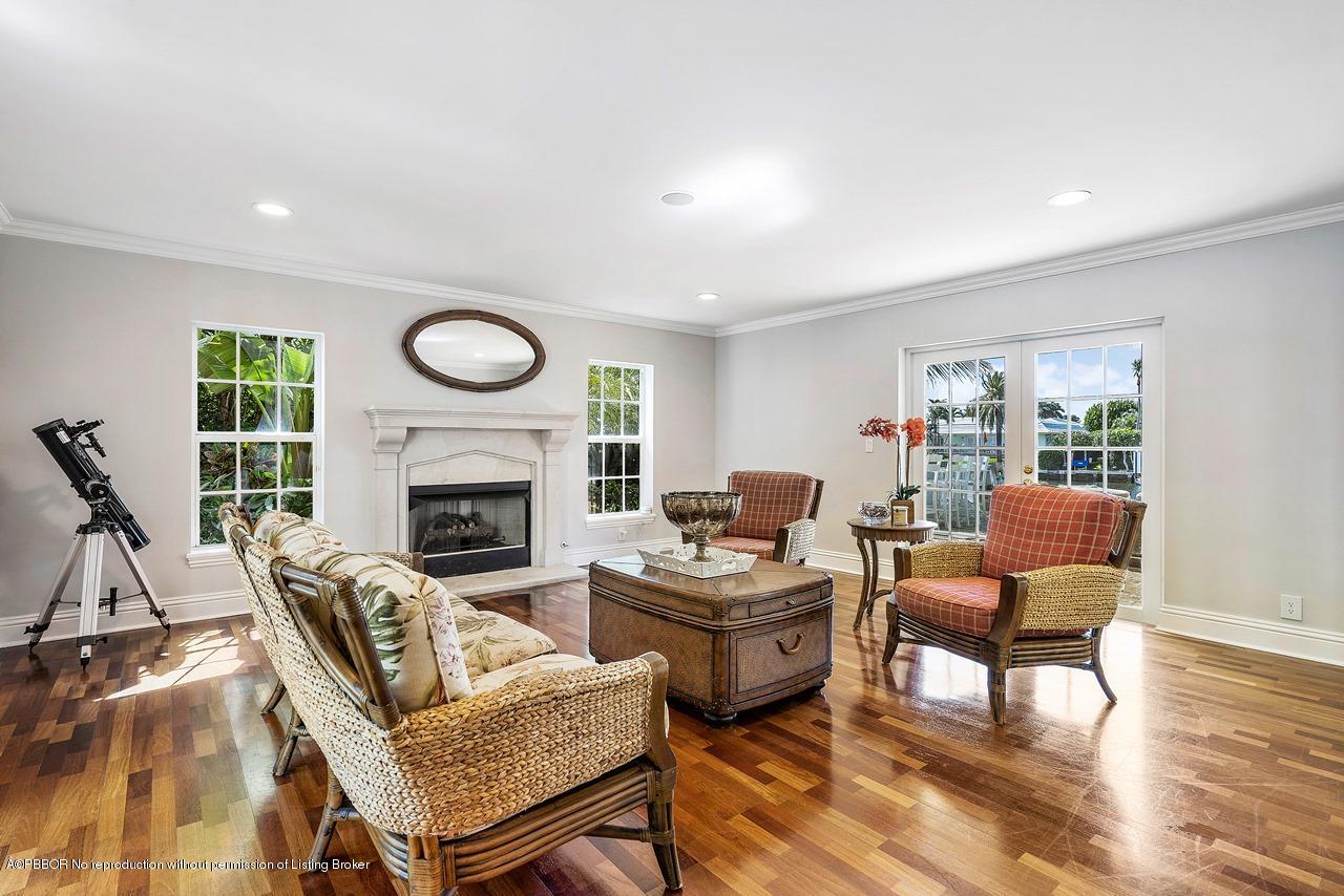 57 River Drive Ocean Ridge, FL 33435 - Photo 5 of 43 a living room with furniture and a fireplace
