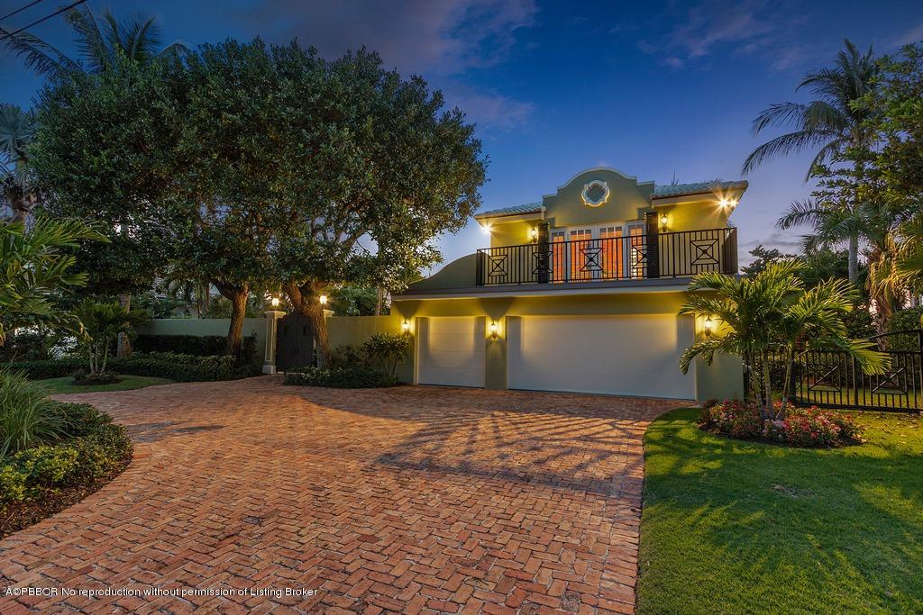 57 River Drive Ocean Ridge, FL 33435 - Photo 42 of 43 a front view of a house with a yard