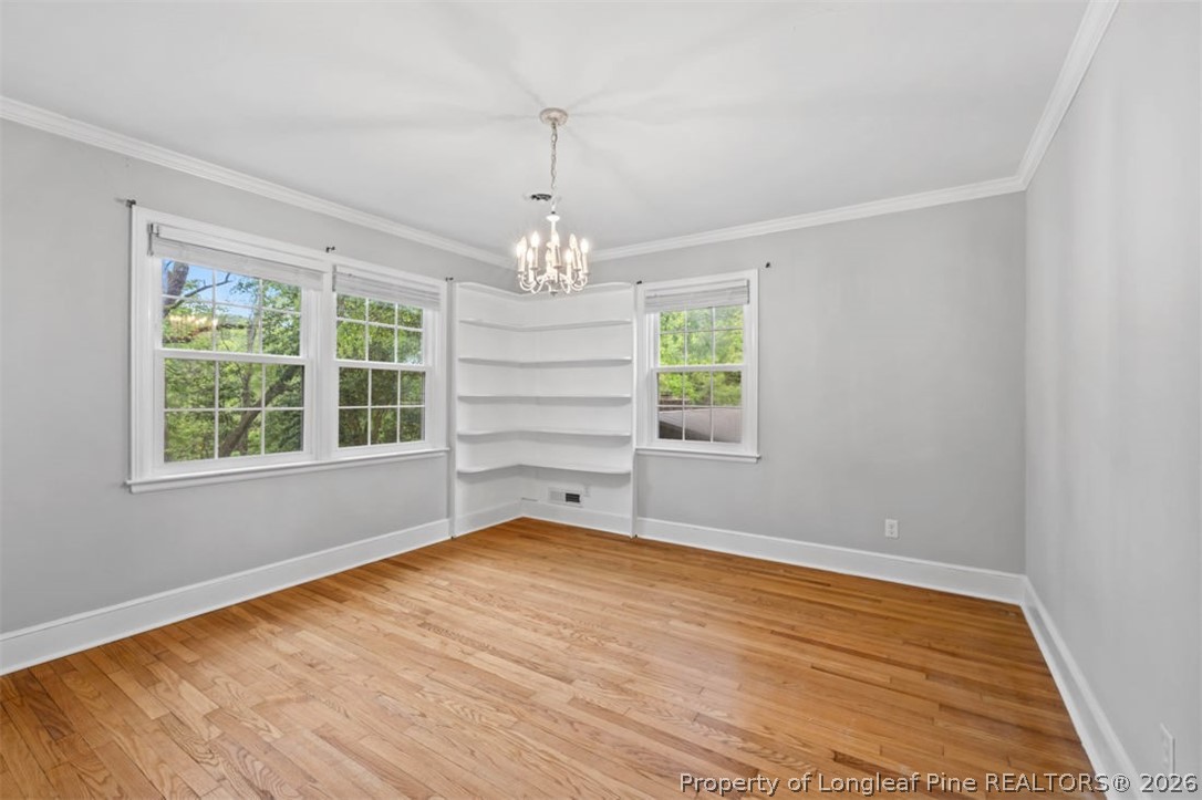 1007 Riverside Boulevard Lumberton, NC 28358 - Photo 29 of 42 a view of empty room with wooden floor and fan