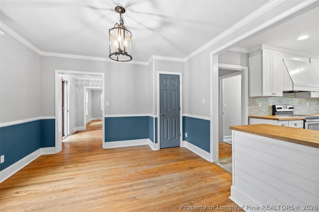 1007 Riverside Boulevard Lumberton, NC 28358 - Photo 10 of 42 a kitchen with stainless steel appliances granite countertop a refrigerator and a sink