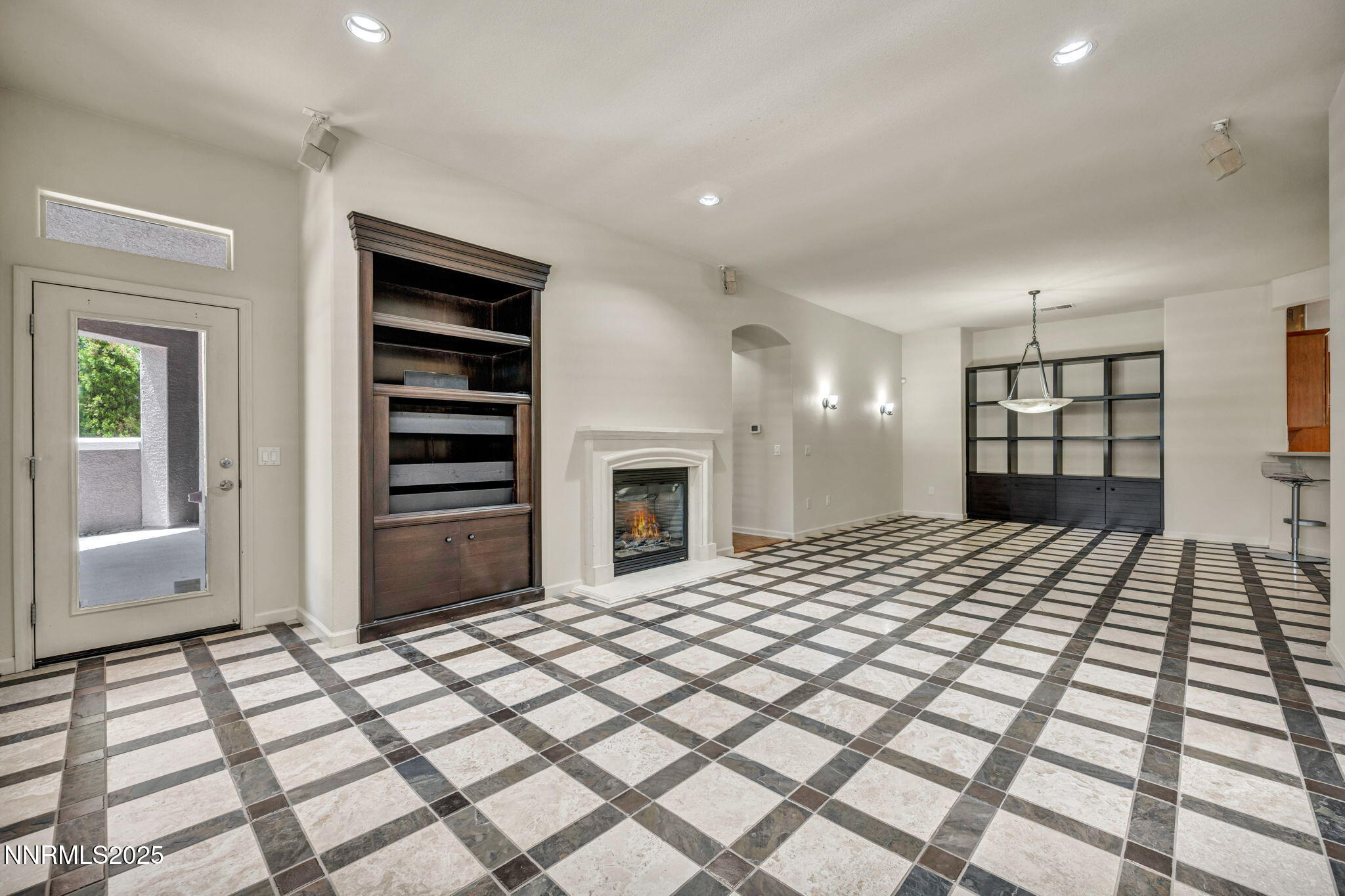 9900 Wilbur May Parkway, Unit 2801 Reno, NV 89521 - Photo 11 of 67 a bedroom with a bed and a dresser