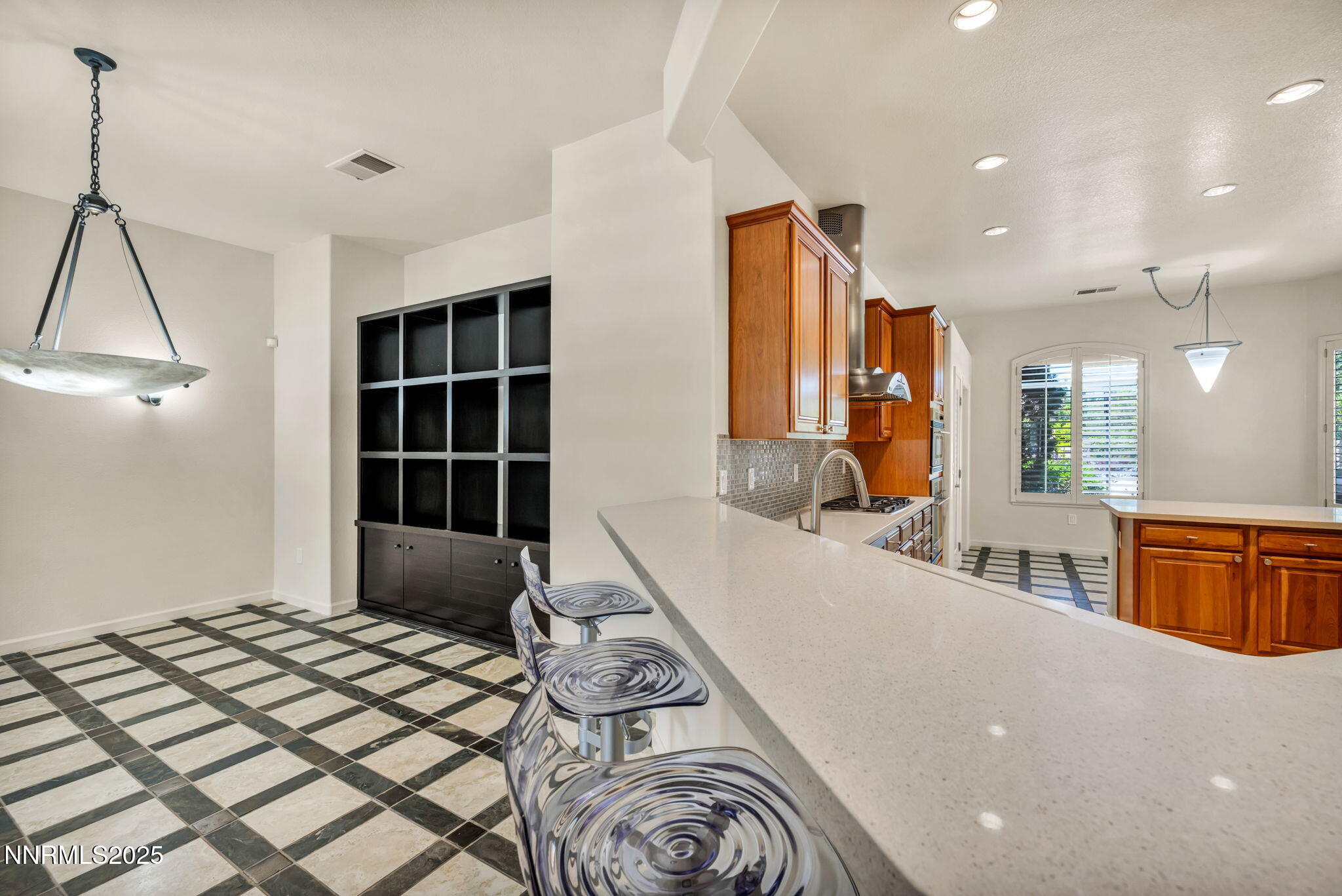 9900 Wilbur May Parkway, Unit 2801 Reno, NV 89521 - Photo 23 of 67 a large bedroom with a bed and a large window